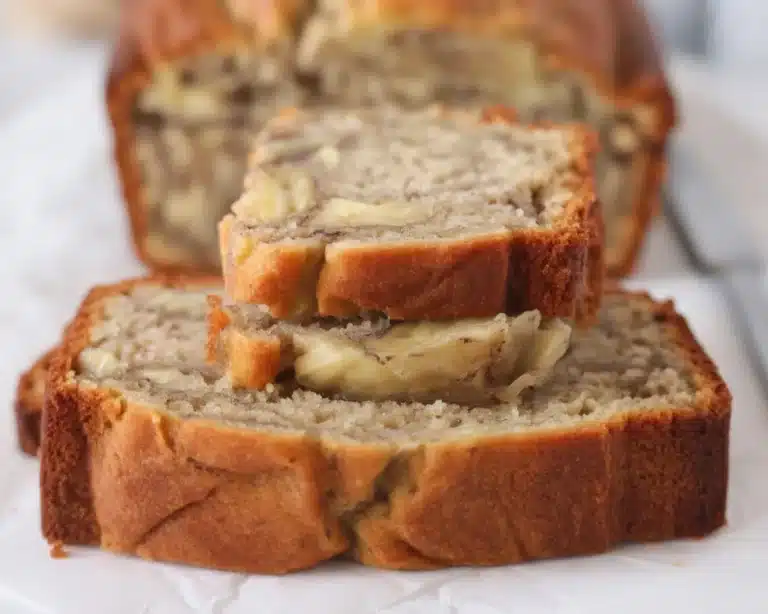 Moist banana bread made with sour cream and overripe bananas, perfect for breakfast or dessert.